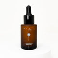 Timeless Organics Skin Care Replenishing Radiance Oil serum in a glass dropper bottle, showcasing a luxurious golden oil.