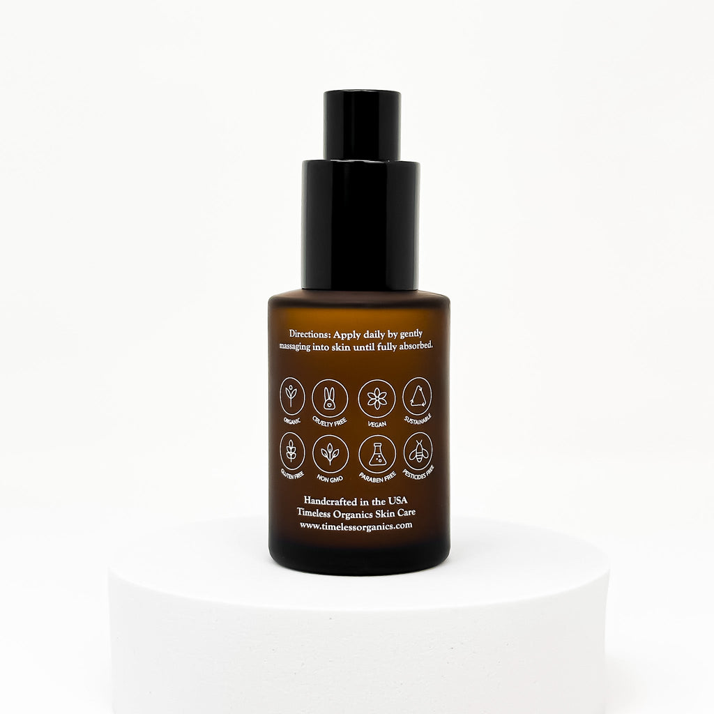 Timeless Organics Skin Care Timeless Glow Serum bottle with dropper, showcasing the serum's sleek design and clear liquid inside.
