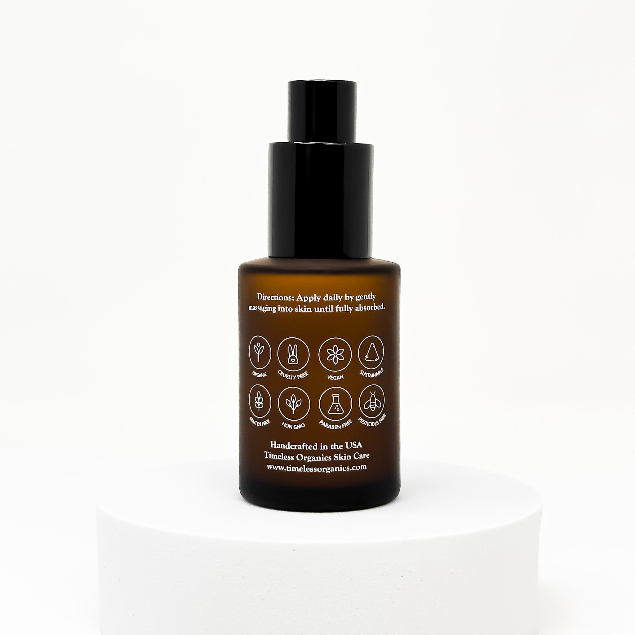 Timeless Organics Skin Care Timeless Glow Serum bottle with dropper, showcasing the serum's sleek design and clear liquid inside.