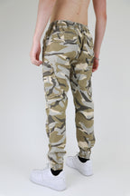 ARMOR JEANS AR1001 light camo cargo joggers showing relaxed fit and multiple pockets on lightweight fabric.