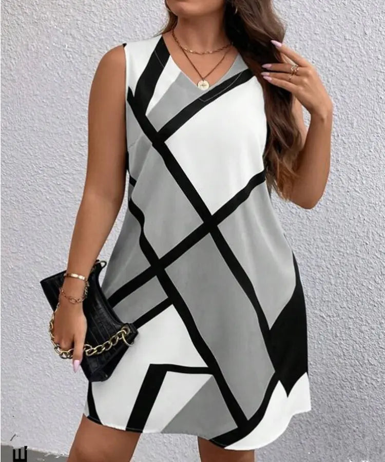 Women’s sleeveless V-neck dress with geometric print, stylish fashion piece from Trendy Attic Store01.