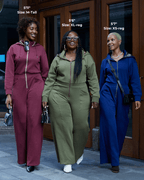 Green satin-lined jumpsuit from Plush Fashion Hub, featuring a sleek fit and elegant design, shown on a model.