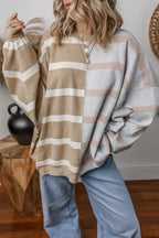 Colorblock striped oversized sweater from Threaded Pear featuring vibrant blue and white hues, soft knit fabric, and relaxed fit.
