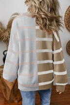 Gray and white striped oversized sweater by Threaded Pear featuring colorblock design and cozy knit texture.