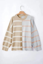 Oversized sweater by Threaded Pear featuring colorful stripe and block design, soft knit fabric, and relaxed fit.