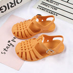 Girls hollow casual flat sandals with open toe design and adjustable straps, by Trendy Attic Store01.