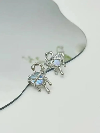 Lava Cutout Heart Stud Earrings - Plush Fashion Hub