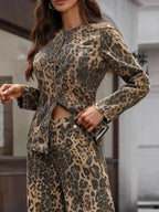 Women's leopard print denim button-up blouse with long sleeves, slightly stretchy fabric, by Gilded Glamour Shop.
