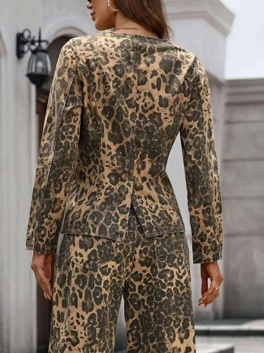 Women's leopard print stretchy denim button-up shirt with long sleeves, stylish blouse from Gilded Glamour Shop.