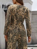 Women's leopard print stretchy denim button-up shirt with long sleeves, stylish blouse from Gilded Glamour Shop.