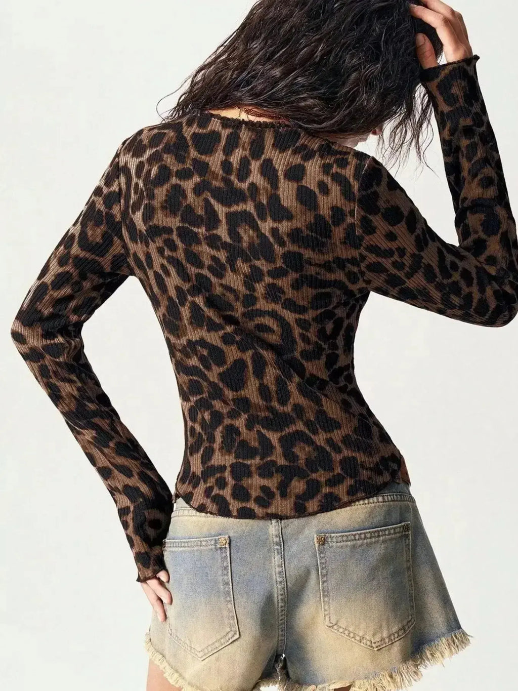 Women's leopard print button-down shirt with delicate lace accents by Plush Fashion Hub, featuring a stylish and feminine design.