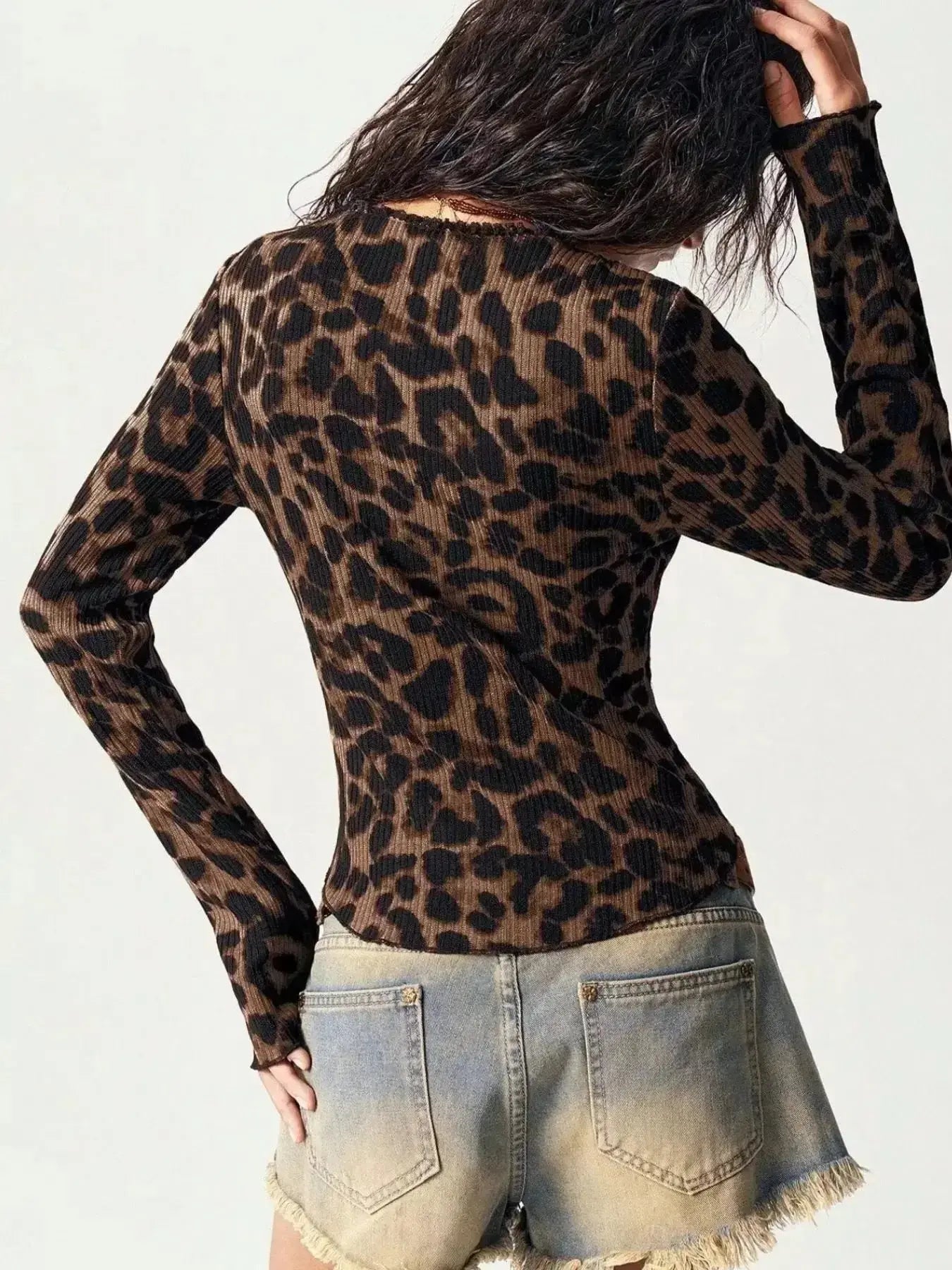 Women's leopard print button-down shirt with delicate lace accents by Plush Fashion Hub, featuring a stylish and feminine design.