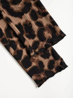 Women's leopard print button-down shirt with delicate lace accents by Plush Fashion Hub, featuring a stylish and trendy design.
