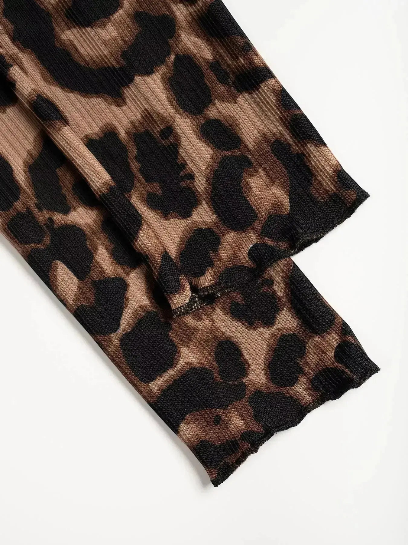 Women's leopard print button-down shirt with delicate lace accents by Plush Fashion Hub, featuring a stylish and trendy design.