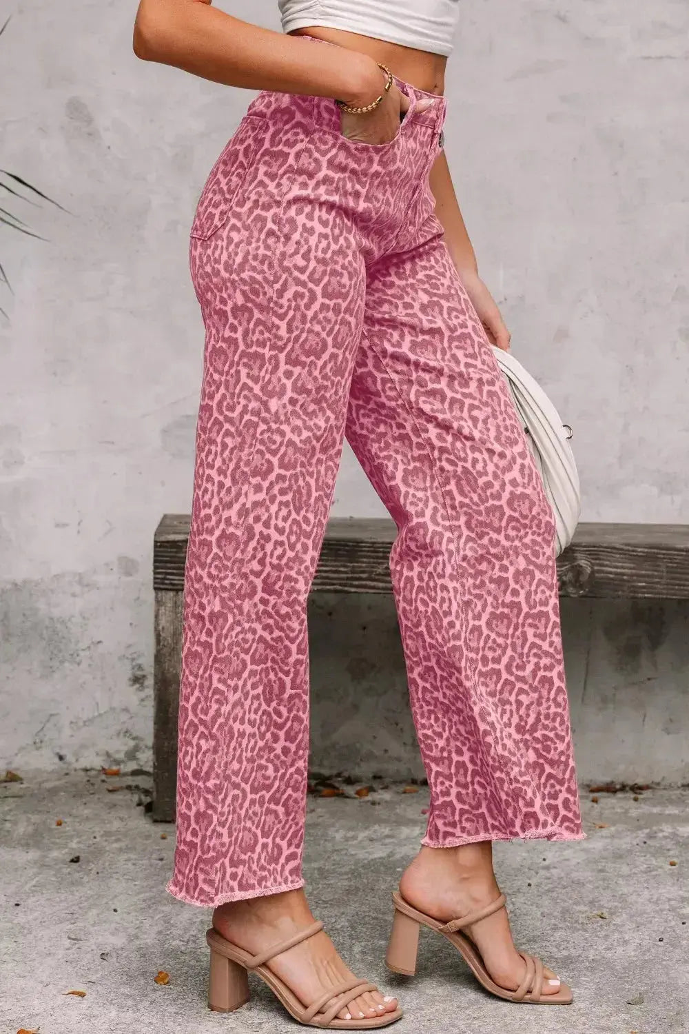 Leopard print high-waisted wide-leg jeans with frayed hem, stylish and trendy from Plush Fashion Hub.