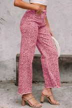 Leopard print high-waisted wide-leg jeans with frayed hem, stylish and trendy from Plush Fashion Hub.