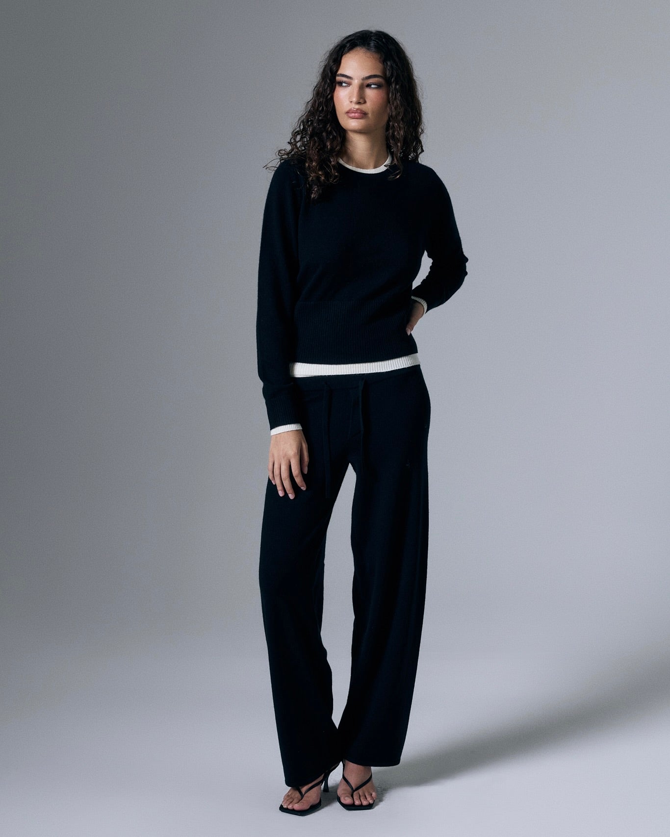 Layered Tove Cashmere Pants by Artless Forever showing the soft, layered design and relaxed fit in a close-up shot.