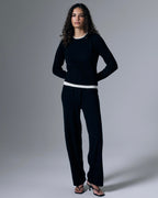 Artless Forever Tove Layered Cashmere Pant shown in a relaxed fit with layered design and soft beige color, styled on a model.