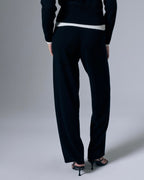 Artless Forever Tove layered cashmere pants, showcasing soft, luxurious fabric and stylish layered design in a relaxed fit.