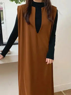 Loose V-neck sleeveless long vest dress by Plush Fashion Hub, minimalist layered midi dress, perfect for casual or layered styling.
