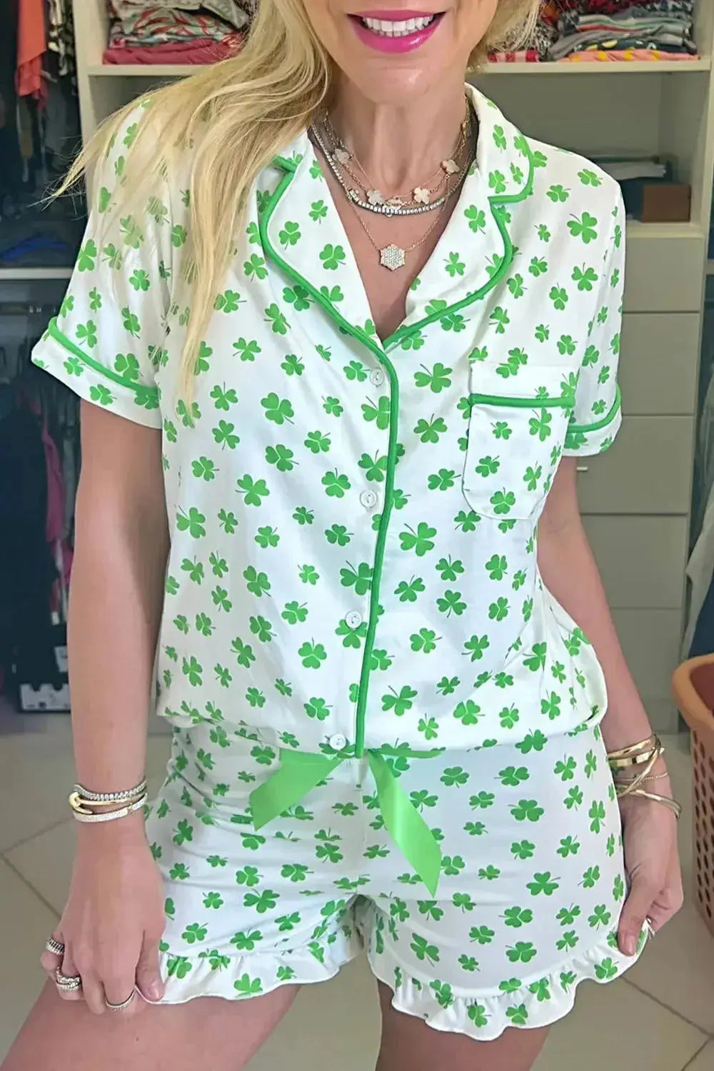 Women's Lucky Clover short sleeve pajama shirt and shorts lounge set by Trendsi, soft and comfortable sleepwear with a charming pattern.
