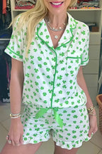 Women's Lucky Clover short sleeve pajama shirt and shorts lounge set by Trendsi, soft and comfortable sleepwear with a charming pattern.