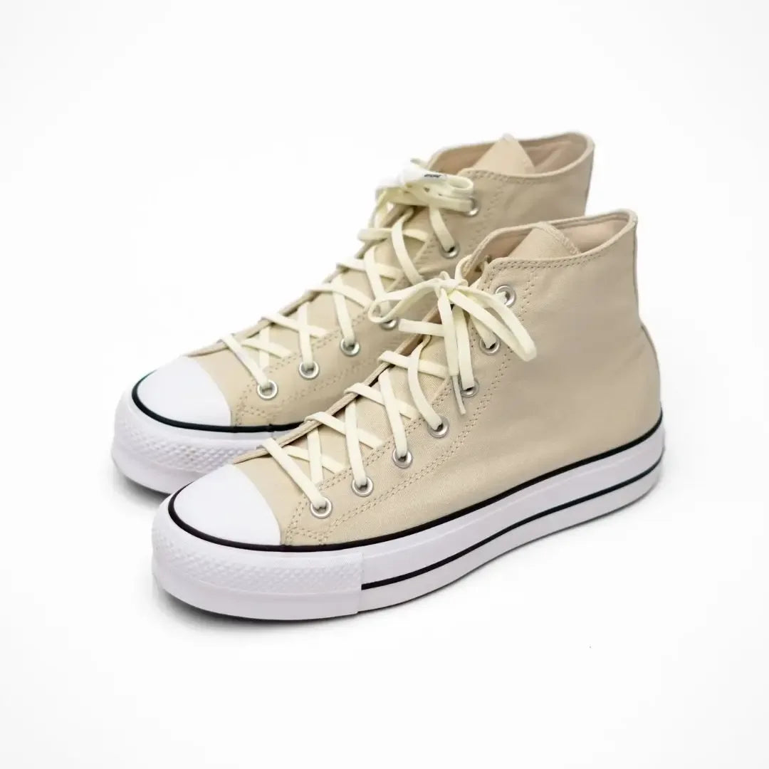 Elastic shoelace named Luxe Creme by Plush Fashion Hub, shown in a natural light with a smooth, creamy color and flexible texture.