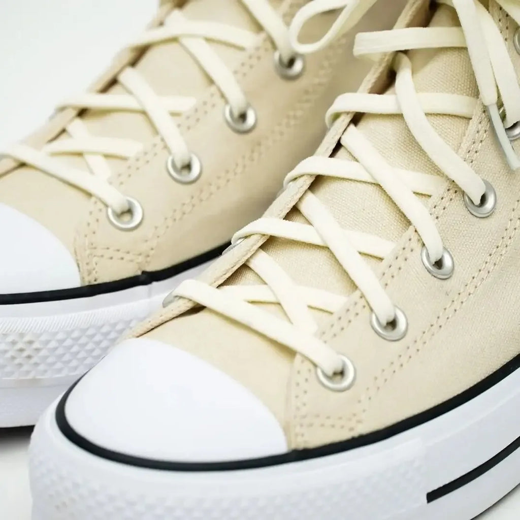 Elastic shoelaces in Luxe Creme color from Plush Fashion Hub, shown in a close-up image highlighting the soft, stretchy material.