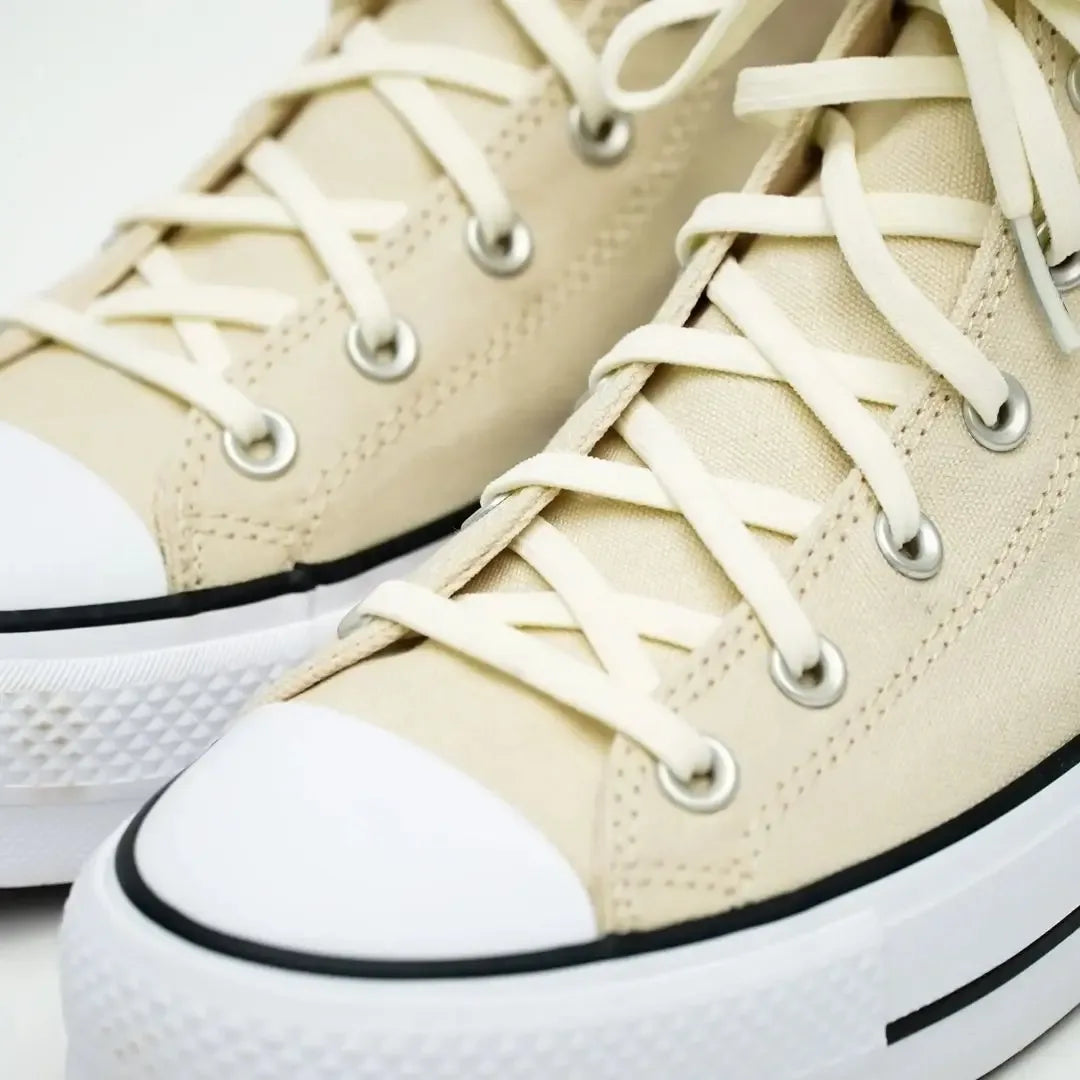Elastic shoelaces in Luxe Creme color from Plush Fashion Hub, shown in a close-up image highlighting the soft, stretchy material.