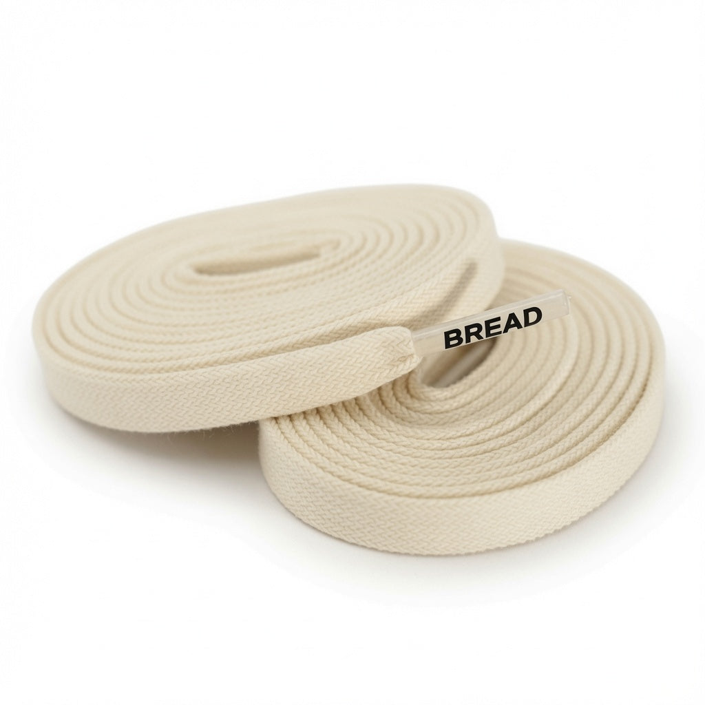 Elastic shoelace in Luxe Creme color by Plush Fashion Hub, showing a close-up of the soft, stretchy material and secure ends.