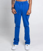 Multi-color stacked sweatpants from Plush Fashion Hub, casual pants with vibrant color blocking and comfortable fit.