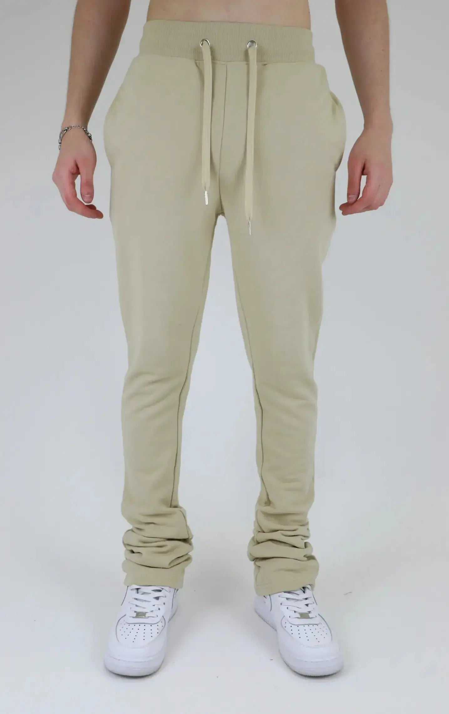Multi-color stacked sweatpants by Plush Fashion Hub featuring a relaxed fit and vibrant color blocks.