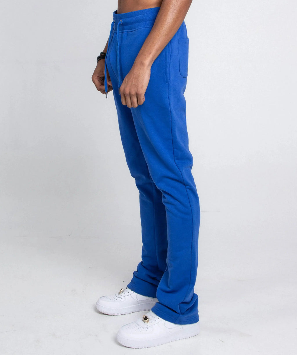 Multi-color stacked sweatpants from Plush Fashion Hub featuring a relaxed fit and vibrant color blocks.