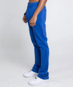 Multi-color stacked sweatpants from Plush Fashion Hub featuring a relaxed fit and vibrant color blocks.