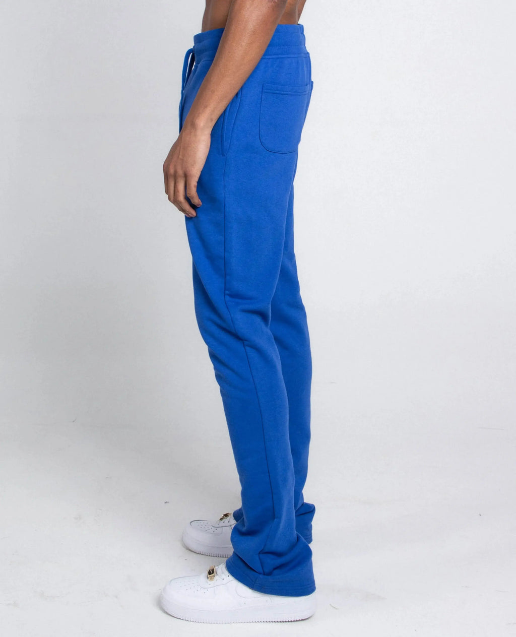 Multi-color stacked sweatpants by Plush Fashion Hub, casual pants with vibrant color blocks and relaxed fit.