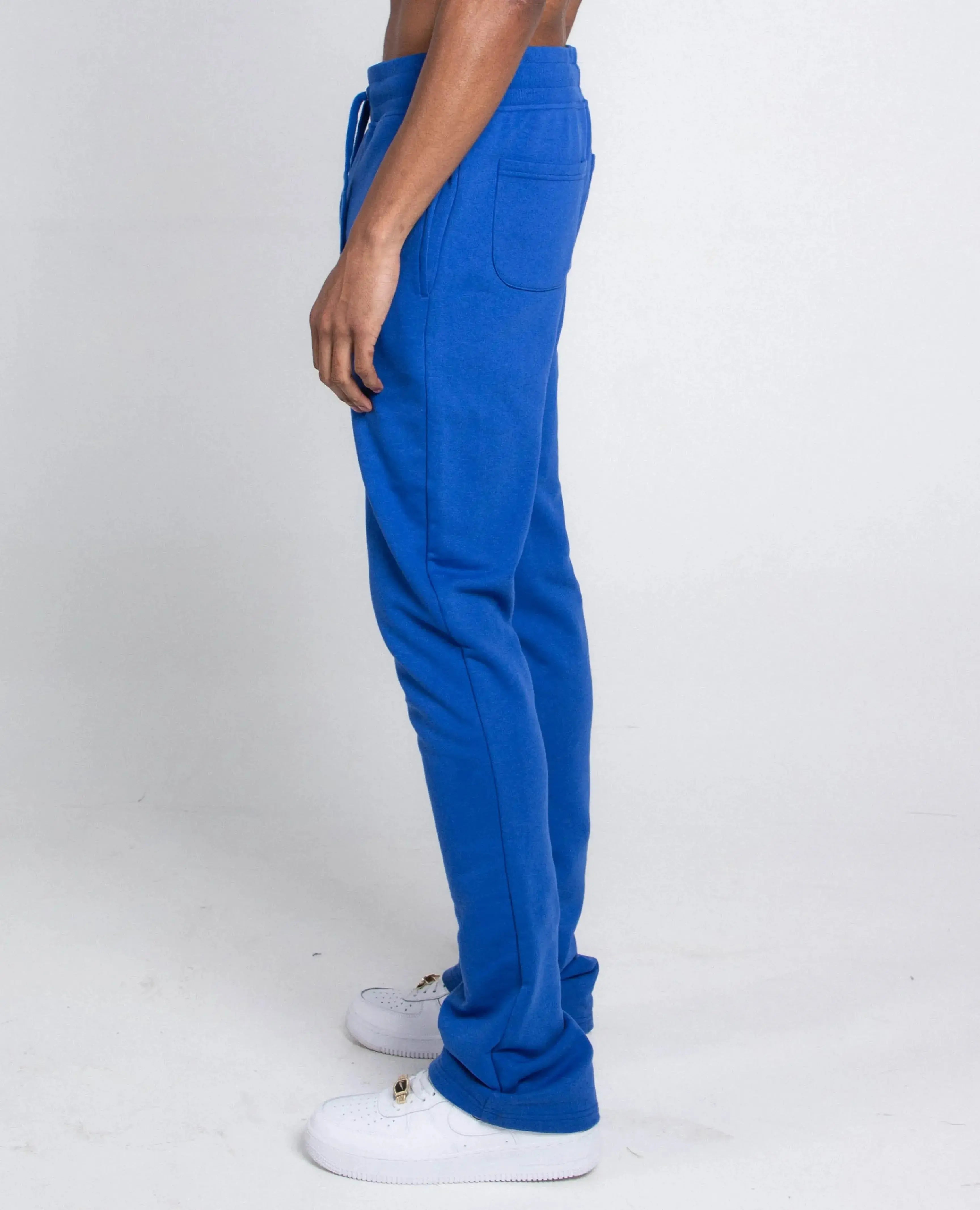 Multi-color stacked sweatpants by Plush Fashion Hub, casual pants with vibrant color blocks and relaxed fit.