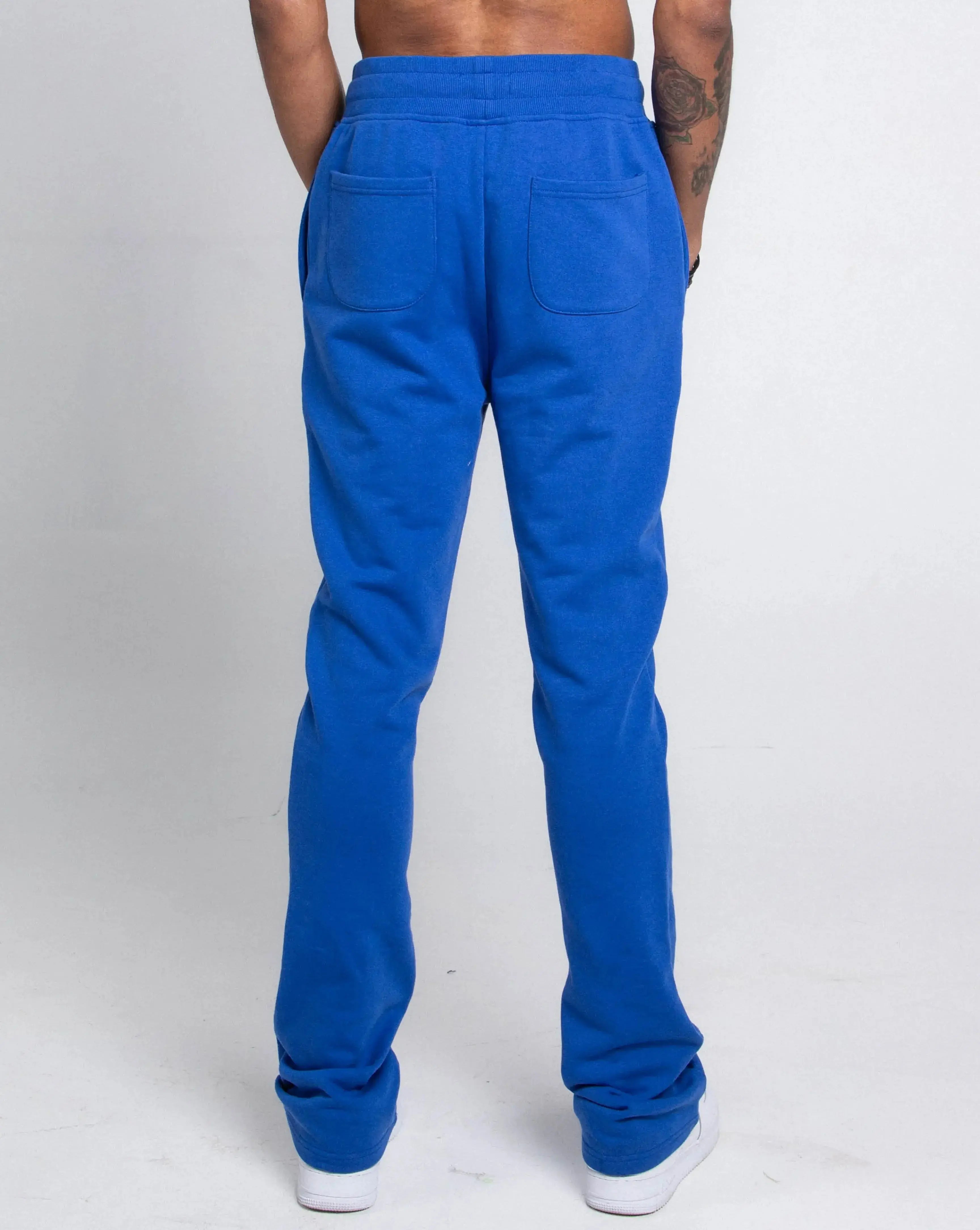 Multi-color stacked sweatpants from Plush Fashion Hub, casual pants with vibrant color blocking and comfortable fit.