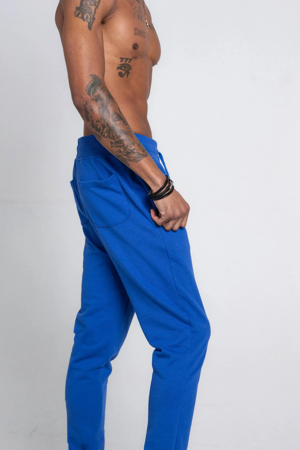 Multi-color stacked sweatpants by Plush Fashion Hub, casual pants with vibrant color blocks and comfortable fit.