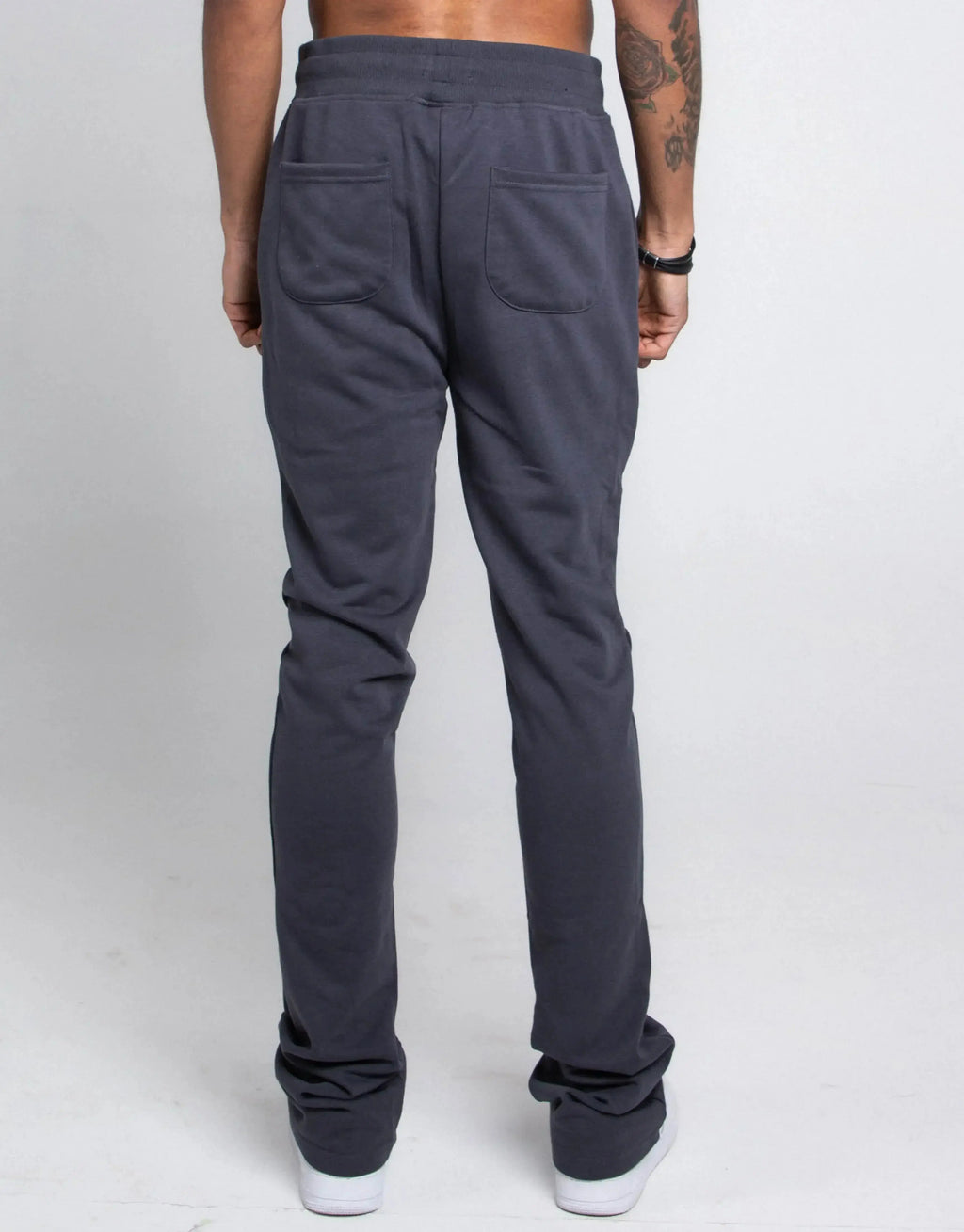 Multi-color stacked sweatpants from Plush Fashion Hub, featuring a relaxed fit and vibrant color blocks.
