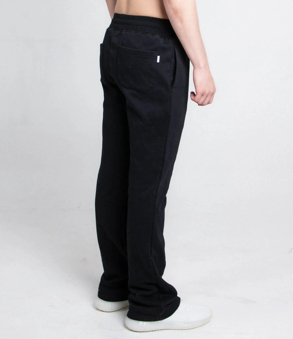 Multi-color stacked sweatpants by Plush Fashion Hub featuring a relaxed fit and vibrant, layered design.