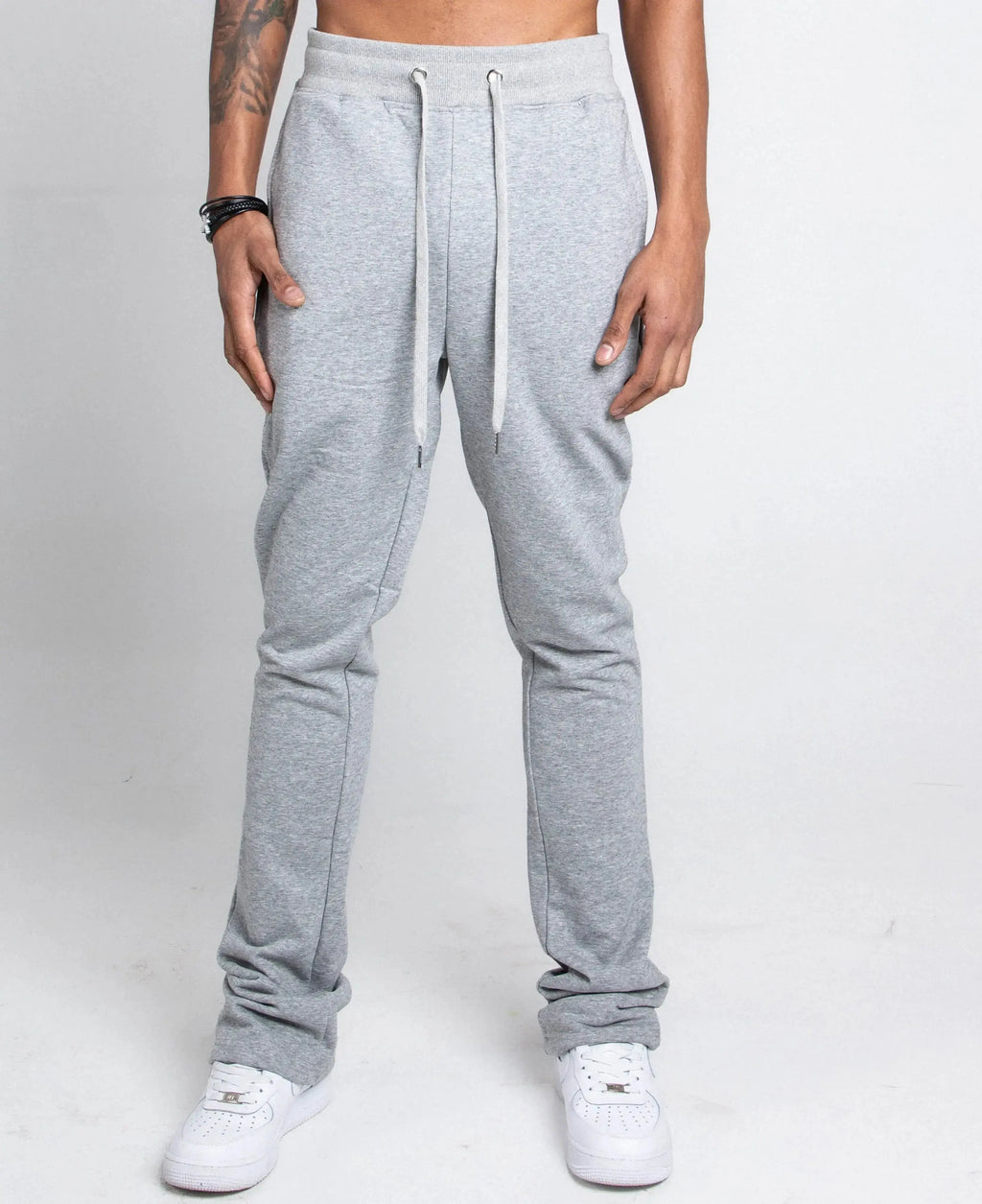 Multi-color stacked sweatpants by Plush Fashion Hub featuring a relaxed fit and vibrant color blocks.