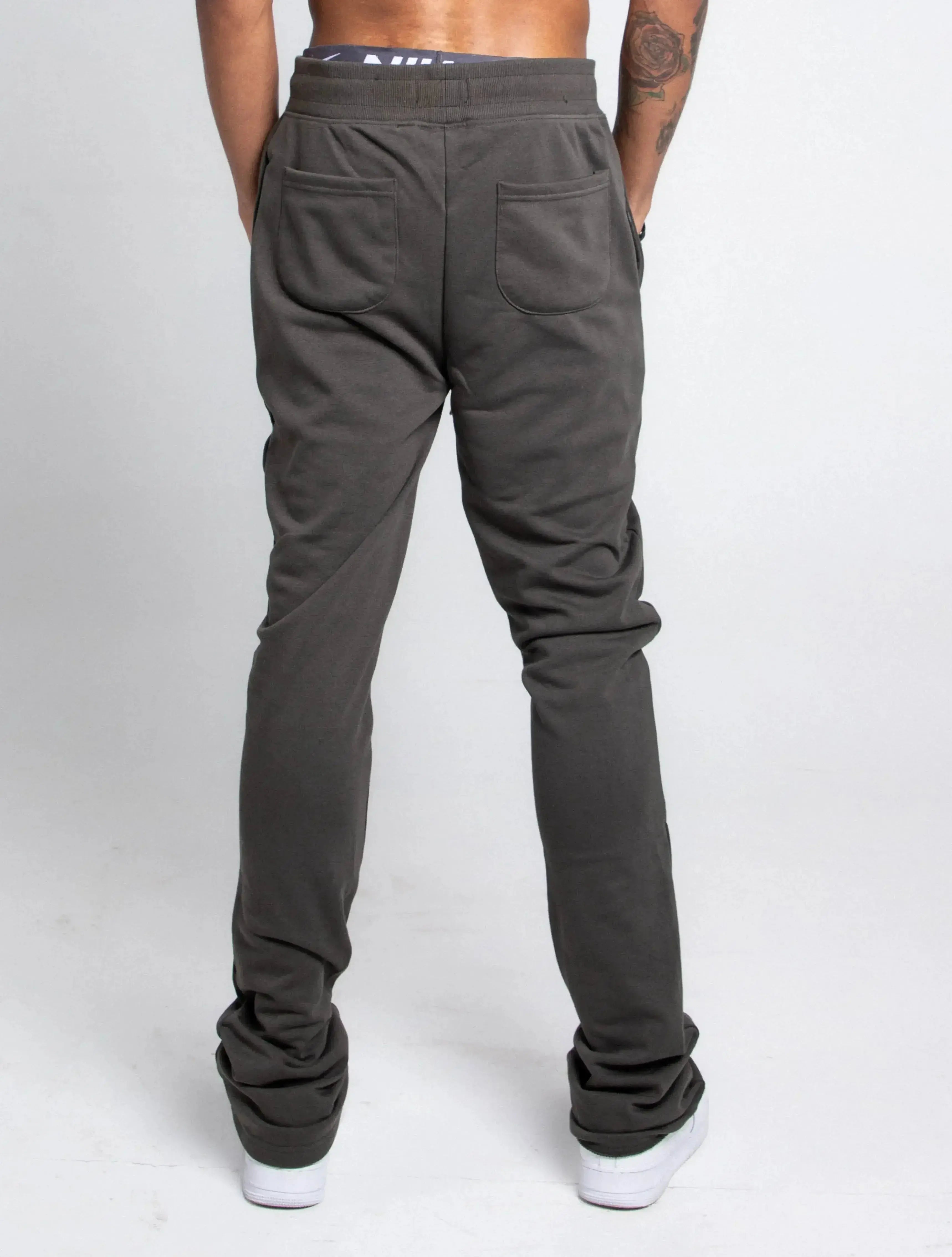 Multi-color stacked sweatpants from Plush Fashion Hub, casual pants with vibrant color blocks and comfortable fit.