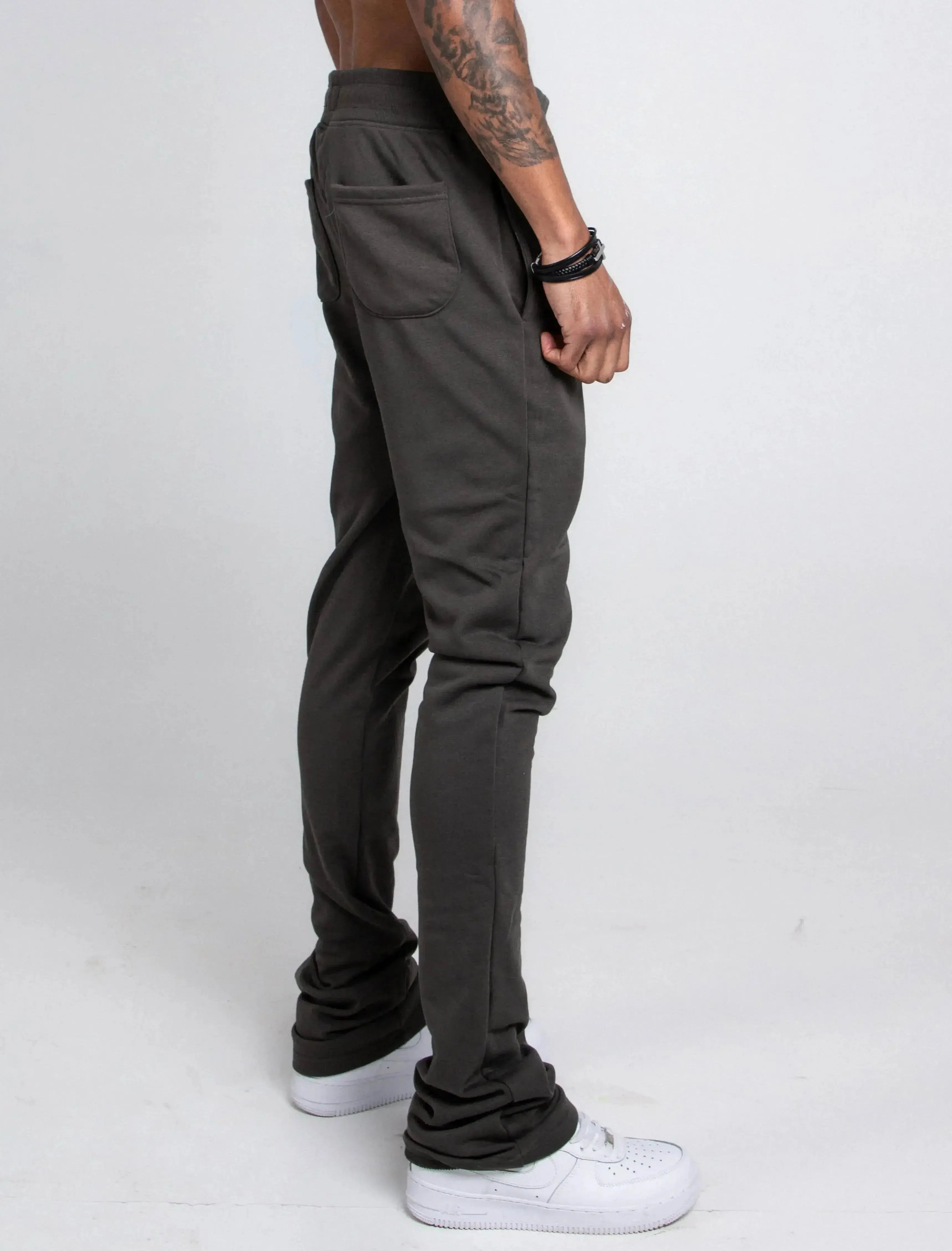 Multi-color stacked sweatpants by Plush Fashion Hub with a relaxed fit, casual style, and vibrant color blocks.