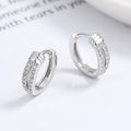 925 silver knot diamond earrings with a stylish, unique design featuring sparkling diamonds and intricate silver craftsmanship.