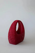 Marishka Marion 3D printed cable handbag with sculptural, architectural design, featuring intricate textured details.