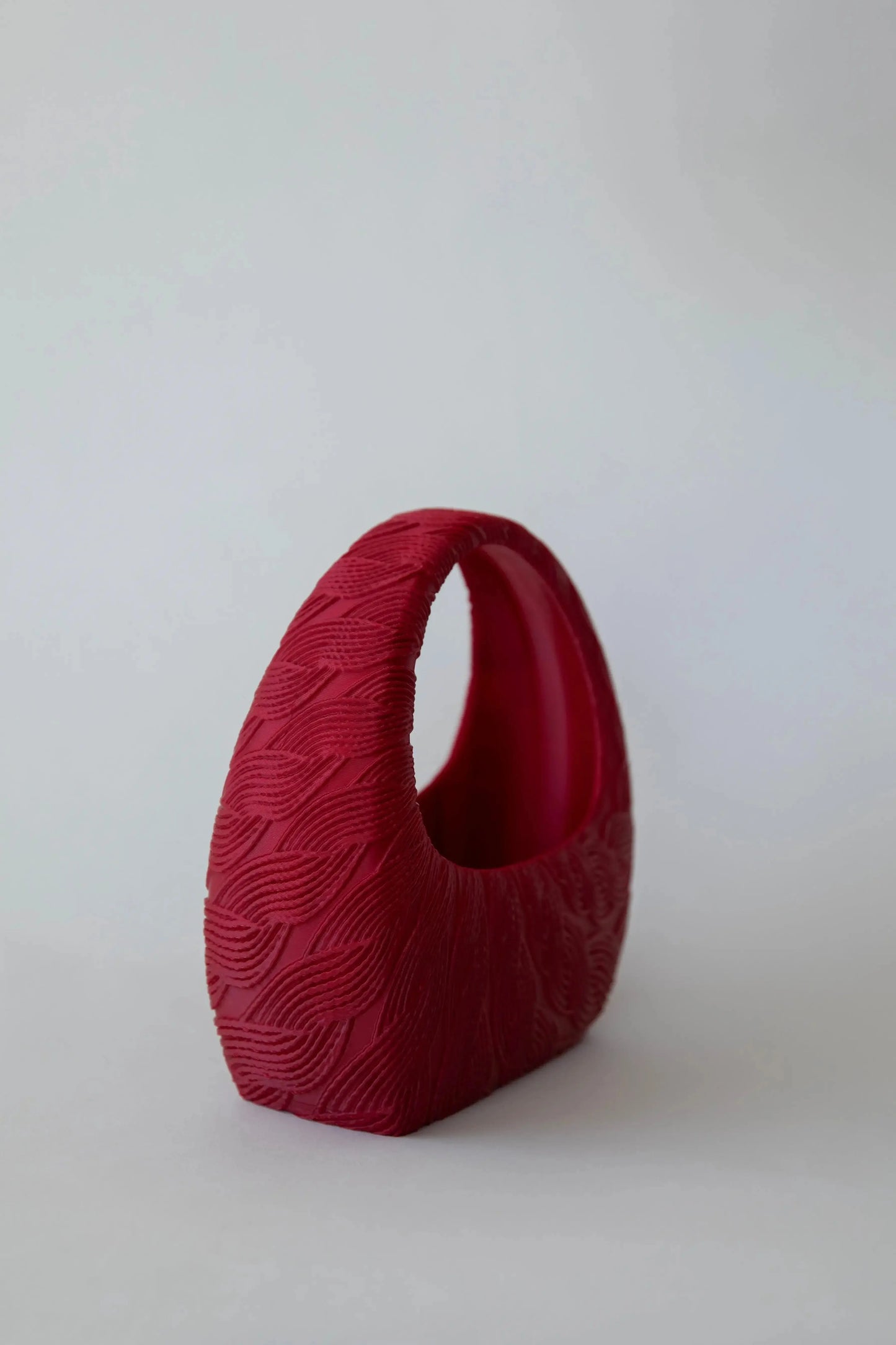 Marion 3D print cable handbag by Plush Fashion Hub featuring sculptural, architectural design in vibrant colors.
