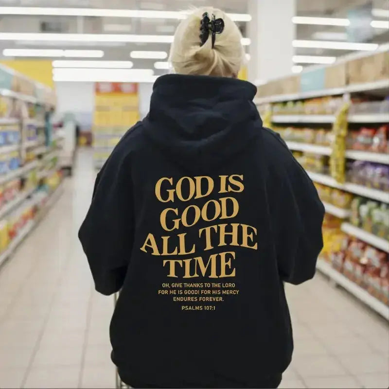 Unisex brushed drawstring hoodie with letter print in urban streetwear style by Plush Fashion Hub, worn by a man and woman.
