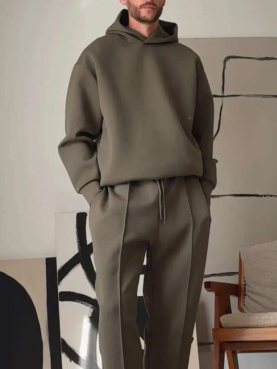 Men's casual hooded sweatshirt and elastic waist jogger pants set from Plush Fashion Hub, featuring comfortable, relaxed-fit clothing.