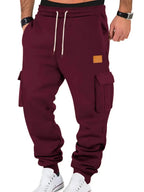 Men's durable cargo jogger pants with drawstring waist by Trendsi, featuring multiple pockets and comfortable fit.