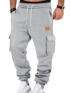 Men's durable cargo jogger pants with drawstring waist from Trendsi, featuring multiple pockets and comfortable fit.